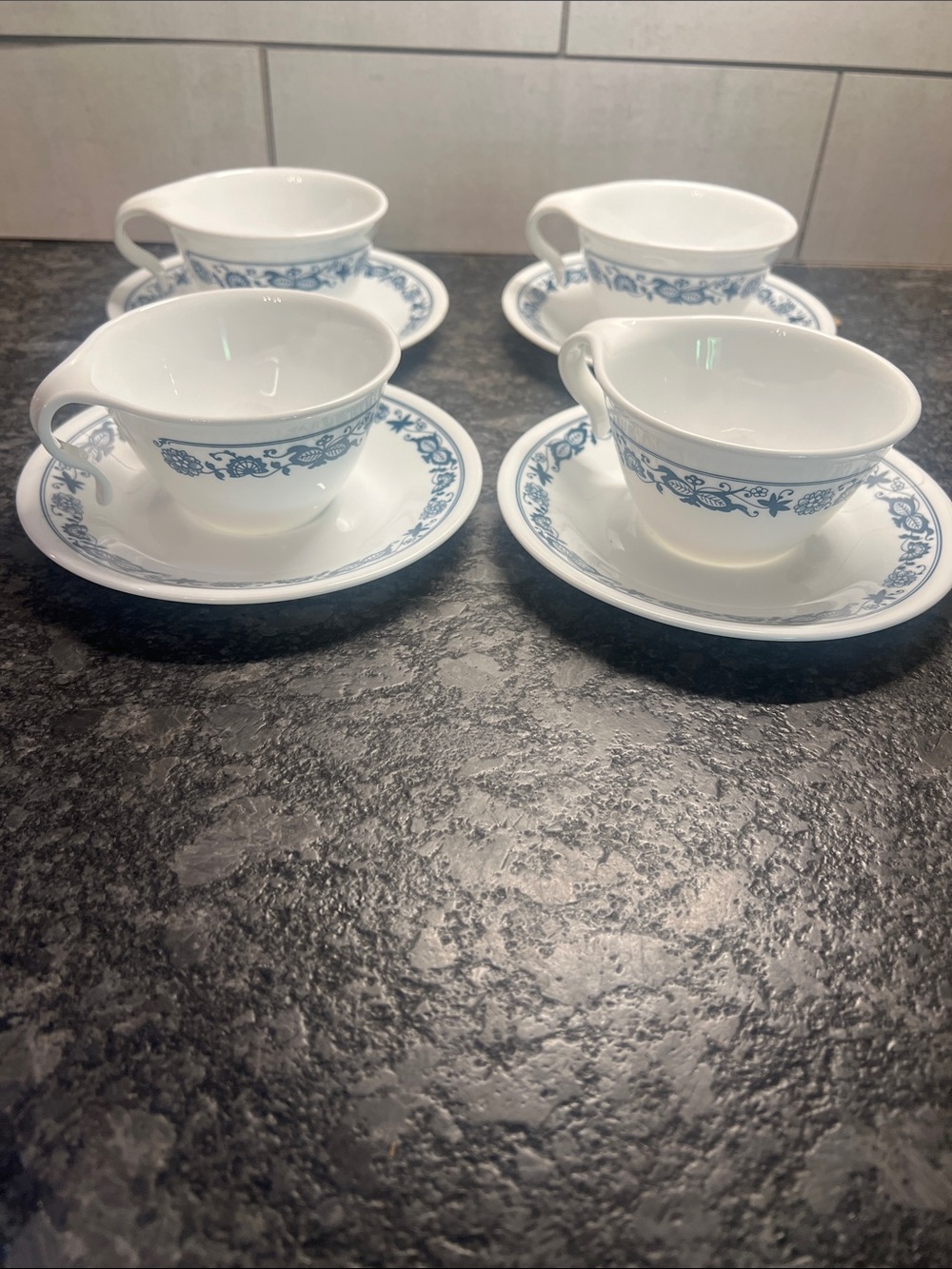 Set of 4 Corelle Blue Onion Hook coffee/tea cup sets. LIKE NEW.